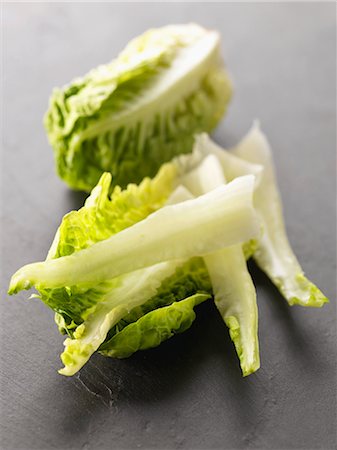 simsearch:825-07649320,k - Taking the middle nerve out of the sucrine lettuce leaves Stock Photo - Rights-Managed, Code: 825-06816205