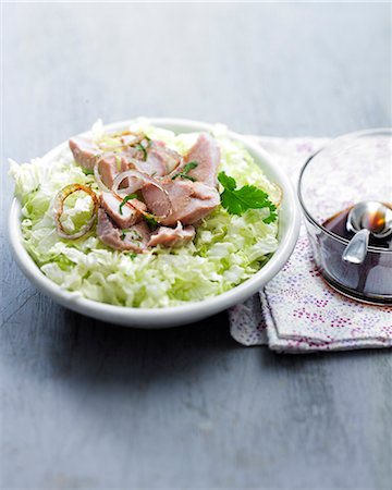 simsearch:825-07649320,k - Flaked tuna with lettuce and soya sauce Stock Photo - Rights-Managed, Code: 825-06816446