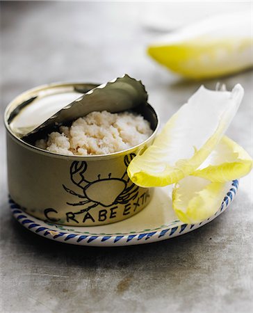 Can of flaked crab meat and chicory leaves Stock Photo - Rights-Managed, Code: 825-06816732