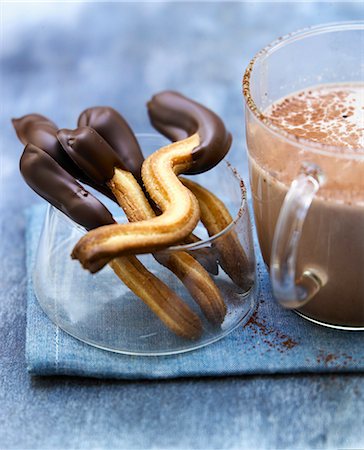 Churros-style shortbread cookies partially coated in chocolate Stock Photo - Rights-Managed, Code: 825-06816815