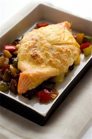 simsearch:825-07522119,k - Cheese-topped grilled soufflé salmon with pan-fried peppers Stock Photo - Rights-Managed, Code: 825-06817323