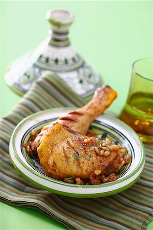 simsearch:825-07522085,k - Chicken Tajine with raisins and pine nuts Stock Photo - Rights-Managed, Code: 825-06817510