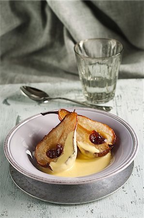 simsearch:825-06315282,k - Roast pears with maple syrup ,dried cranberries and cardamom-flavored custard Stock Photo - Rights-Managed, Code: 825-07076448