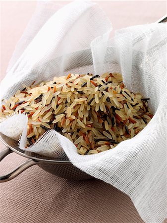 simsearch:825-07076761,k - Mixed rice in a sieve before rinsing Stock Photo - Rights-Managed, Code: 825-07076527