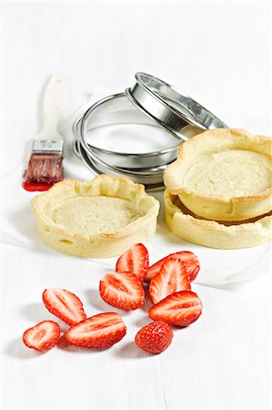 Preparing Gariguette strawberry tartlets Stock Photo - Rights-Managed, Code: 825-07076520