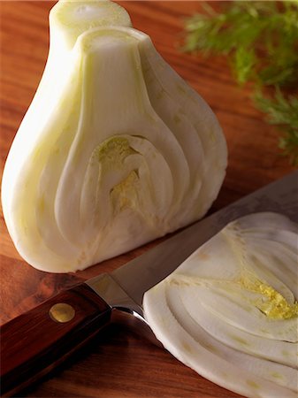 simsearch:700-06334366,k - Cutting a fennel bulb in half Stock Photo - Rights-Managed, Code: 825-07076559