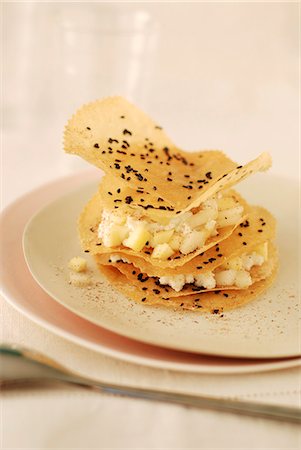 simsearch:825-05814612,k - Pear,Brousse cheese,honey,nutmeg and pepper crisp filo pastry Mille-feuille Stock Photo - Rights-Managed, Code: 825-07076836