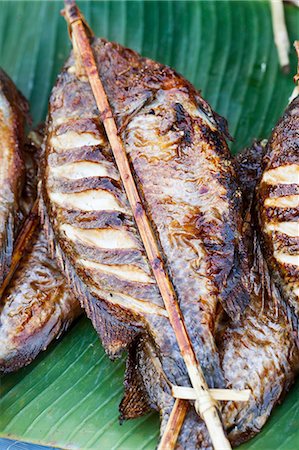 simsearch:825-02306228,k - Grilled fish on a stall in Luang Prabang, Laos Foto de stock - Con derechos protegidos, Código: 825-07077160