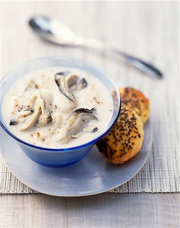 simsearch:825-07649320,k - Creamy oyster soup with flaky pastries with poppyseeds Stock Photo - Rights-Managed, Code: 825-07077770