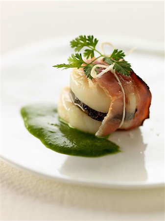 simsearch:825-07649320,k - Scallop,truffle and streaky bacon appetizer with chervil sauce Stock Photo - Rights-Managed, Code: 825-07077892
