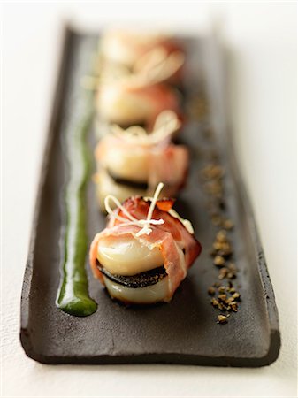 simsearch:825-07649320,k - Scallop,truffle and streaky bacon appetizers with chervil sauce Stock Photo - Rights-Managed, Code: 825-07077893