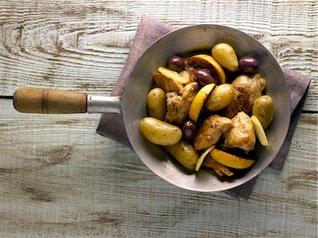 simsearch:825-07522085,k - Sauteed chicken breast with potatoes,lemons and olives Stock Photo - Rights-Managed, Code: 825-07522086