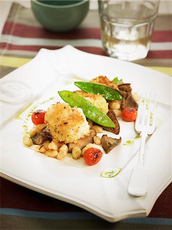 Crisp monkfish with white beans,mushrooms,sugar peas and tomatoes Stock Photo - Rights-Managed, Code: 825-07522253