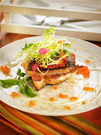 Fried trout with Spanish ham,Del piquillo peppers and trout roe Stock Photo - Rights-Managed, Code: 825-07522268