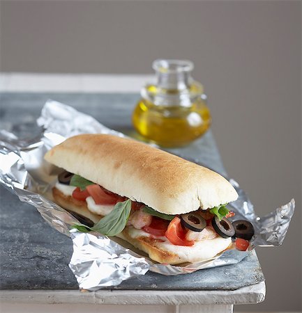 simsearch:825-07522085,k - Chicken,olive,tomato and basil sandwich Stock Photo - Rights-Managed, Code: 825-07522538