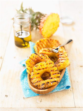 simsearch:825-06315282,k - Grilled pineapple with vanilla oil Stock Photo - Rights-Managed, Code: 825-07522883