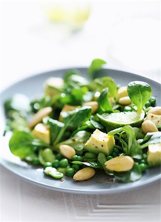 Pea,broad bean,avocado,corn lettuce and almond salad Stock Photo - Rights-Managed, Code: 825-07523019