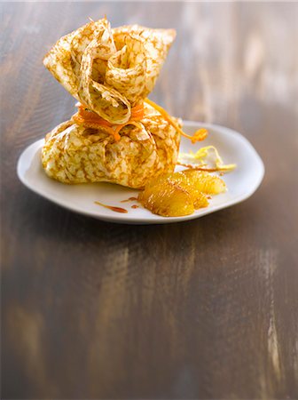 Caramelized orange and lemon pancake purse Stock Photo - Rights-Managed, Code: 825-07523144