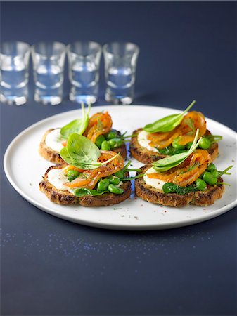 simsearch:825-07522119,k - Marinated salmon,horseradish,broad bean and spinach on toasts Stock Photo - Rights-Managed, Code: 825-07599752