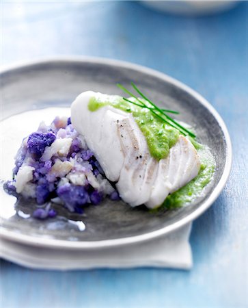 simsearch:825-07522119,k - Piece of cod with creamy chive sauce,purple potato and celeriac mash Stock Photo - Rights-Managed, Code: 825-07652602
