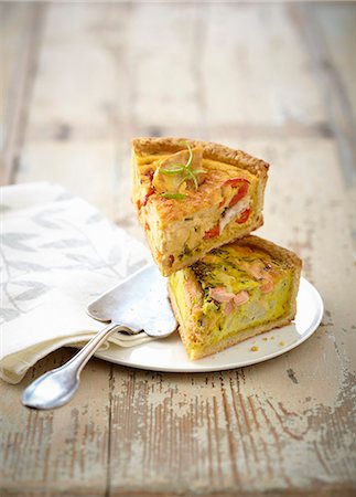 simsearch:825-07522119,k - Slice of chicken and pepper savory tart and  salmon and cauliflower savory tart Stock Photo - Rights-Managed, Code: 825-07652660