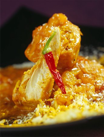 simsearch:825-02302497,k - Chicken curry with two chutneys Stock Photo - Rights-Managed, Code: 825-02307462