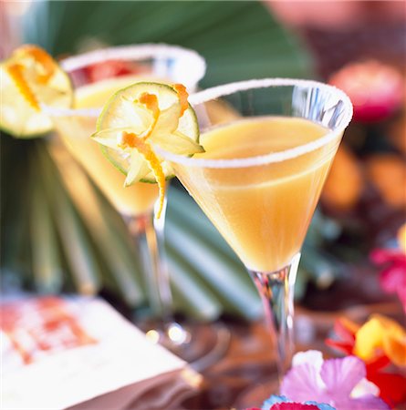 simsearch:652-03802277,k - Passion fruit and lime cocktail Stock Photo - Rights-Managed, Code: 825-03627022