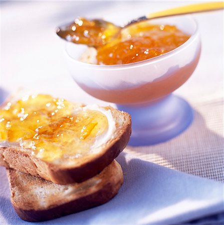 Orange jam and slices of bread and jam Stock Photo - Rights-Managed, Code: 825-03627040