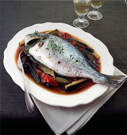 simsearch:825-03627010,k - Oven-baked sea bream with bay leaves Stock Photo - Rights-Managed, Code: 825-03627867