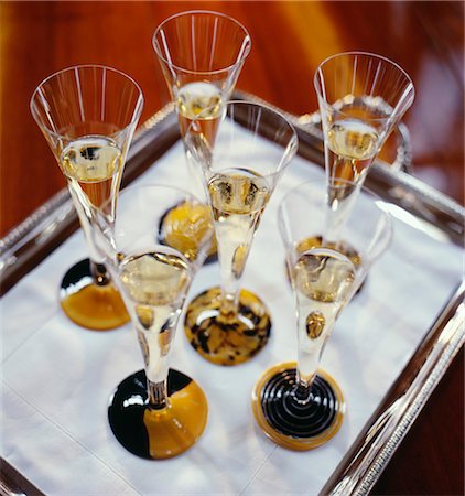 simsearch:825-05985931,k - Glasses of champagne on a tray Stock Photo - Rights-Managed, Code: 825-03627968