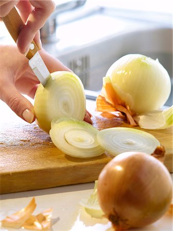 Slicing onions Stock Photo - Rights-Managed, Code: 825-03628842
