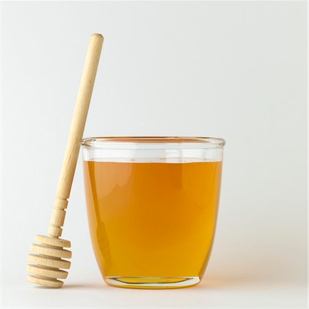 simsearch:825-03628865,k - Pot of honey and wooden honey spoon Stock Photo - Rights-Managed, Code: 825-03628867
