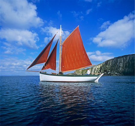 Sailboat in the sea, Galway Hooker, Galway Bay, Republic Of Ireland Stock Photo - Rights-Managed, Code: 832-03232208