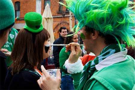 Dublin, Ireland; A Woman Gets Her Face Painted For Saint Patrick's Day Stock Photo - Rights-Managed, Code: 832-03640968