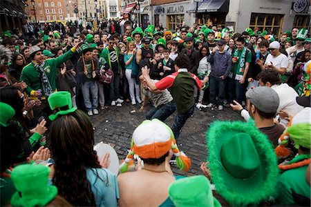 performer - Dublin, Ireland; People Gathered To Watch A Street Performer On Saint Patrick's Day Stock Photo - Rights-Managed, Code: 832-03640979