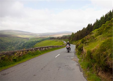 roadway with motorcyclist near guinness estates and lough tay; wicklow county, ireland Stock Photo - Rights-Managed, Code: 832-03641026