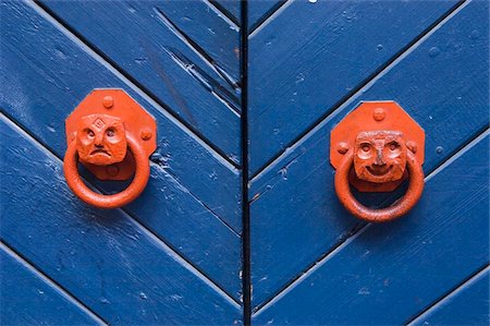 Smiling and unhappy door handle faces, Close Up Stock Photo - Rights-Managed, Code: 832-03724811