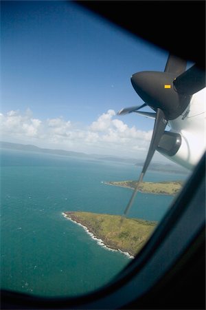 View through airplane window of tropical islands Stock Photo - Rights-Managed, Code: 832-03723941