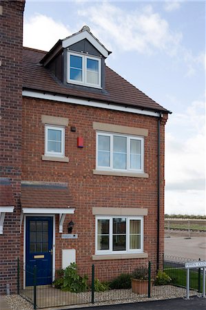 residential fence - Mews Style Houses, Misterton and Retford, Nottinghamshire. Architects: Spawforth Associates Stock Photo - Rights-Managed, Code: 845-04826574