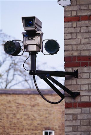 CCTV security camera mounted on corner of building. Stock Photo - Rights-Managed, Code: 845-04827097