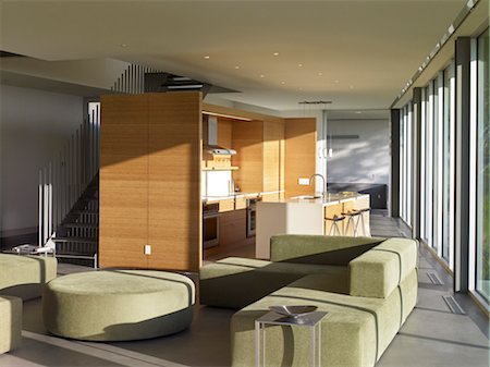 Green seating area and freestanding kitchen in open plan Briarcrest House, Beverly Hills, California, USA. Architects: SPF Architects Stock Photo - Rights-Managed, Code: 845-05837899