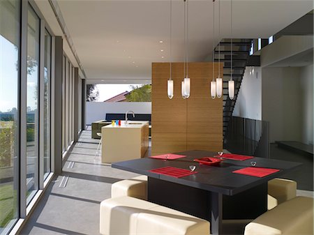 simsearch:845-06008034,k - Open plan dining room with freestanding kitchen in Briarcrest House, Beverly Hills, California, USA. Architects: SPF Architects Stock Photo - Rights-Managed, Code: 845-05837901