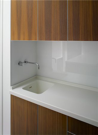 simsearch:845-07561516,k - Wall mounted tap fitting above sink in kitchen extension, Paul Archer Design, Edgware, London, UK. Architects: Paul Archer Design Stock Photo - Rights-Managed, Code: 845-05837955