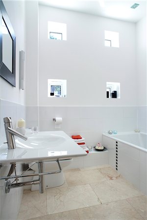 simsearch:845-07561516,k - Moonraker bathroom with recessed windows, Paul Humphries Architects, UK. Architects: Paul Humphries Architects Stock Photo - Rights-Managed, Code: 845-05838065