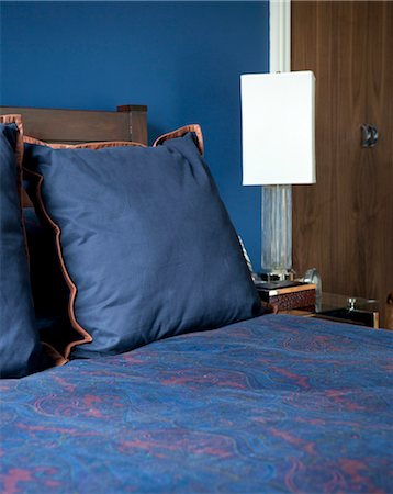 simsearch:845-06008034,k - Blue and orange cushions on bed in Addison Road, UK. Stock Photo - Rights-Managed, Code: 845-05838108