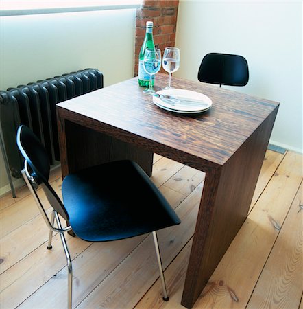 radiator (heater) - Two chairs either side of wooden table in modern dining room Stock Photo - Rights-Managed, Code: 845-05838857