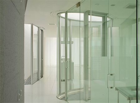 picture of open door of home - Shower unit enclosed in glass cubicle in contemporary bathroom Stock Photo - Rights-Managed, Code: 845-05838927