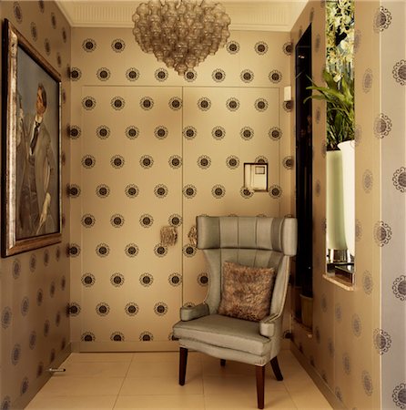 Entrance hall with patterned wallpaper concealing front door, Portobello, London, UK. Designed by Designed by Stephen Ryan, Photograph Stock Photo - Rights-Managed, Code: 845-06008071
