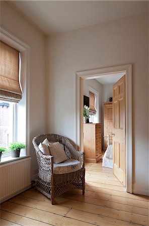 residential - Wicker chair at doorway in Macclesfield townhouse, Cheshire, England, UK Stock Photo - Rights-Managed, Code: 845-07584944