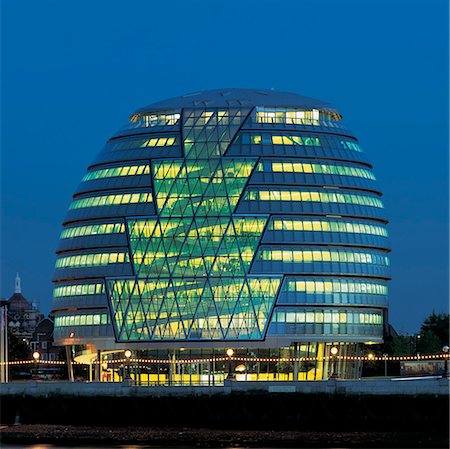 City Hall GLA, London. Dusk overview across Thames. 1999-2002. Architect: Sir Norman Sir Norman Foster and Partners Stock Photo - Rights-Managed, Code: 845-02728058